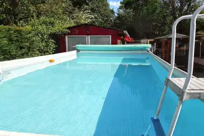 Image de Homerez - Chalet de charme avec piscine à Molinot