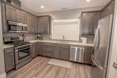 Image de Nouveau condo moderne avec accès au Canada et aux îles