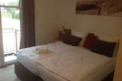 Image de Chambre double Haus Anna 23 avec balcon - Usedom Bike-Hotel & Suites *** à 80 m de la plage de la mer Baltique