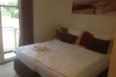 Image de Chambre double Haus Anna 21 avec balcon - Usedom Bike-Hotel & Suites *** à 80 m de la plage de la mer Baltique