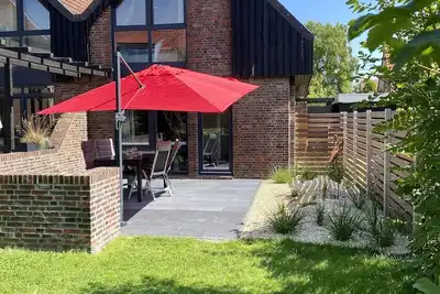 Image de Appartement incroyablement calme près de la plage!