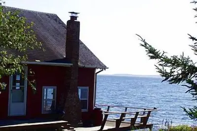 Image de House At The Point - Cottage rustique au bord de l'océan