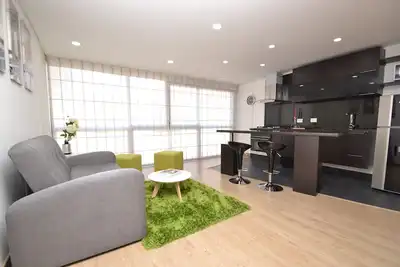 Image de Gloriana - 1 Br. Appartement Exécutif avec Lit King Size