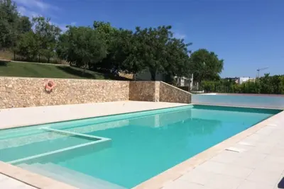 Image de Luxueux appartement T3 avec grand jardin privé et piscine commune