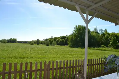 B & B Boszicht Leeuwarden Véranda avec vue rurale sur la forêt de la ville adjacente