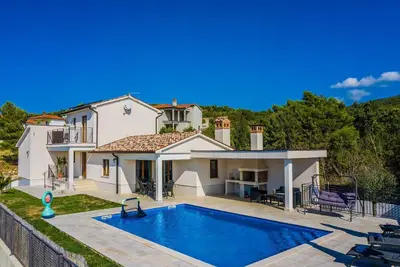 Image de Maison de vacances Koromacno pour 1 - 8 personnes avec 4 chambres à coucher - Maison de vacances