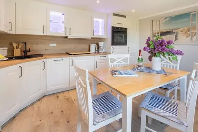Appartement idyllique dans le style d'une maison de campagne avec cheminée
