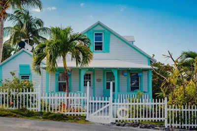 Image de Palm Cottage - Cottage de 3 chambres sur la plage à quelques pas de la plage