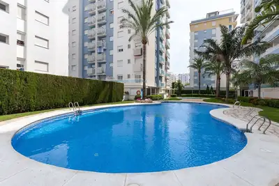 Image de Coralina - Apartment with shared pool in Playa de Gandia. Free WiFi