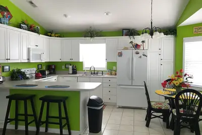 Image de \"House of Sunshine\" Voiturette de golf et Wifi gratuits