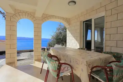 Image de Appartement de deux chambres avec la terrasse Stanici, Omis (A-2818-f)