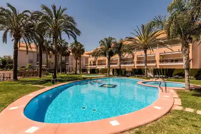 Image de Bel appartement pour 4 personnes avec Wifi, climatisation, piscine, Tv, terrasse et parking
