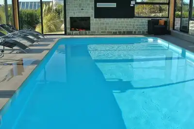 Image de Villa 300 M2 ⭐️⭐️⭐️⭐️⭐️ À 150 m Plage Vue Mer Avec Piscine Interieure Pour 13 Pers