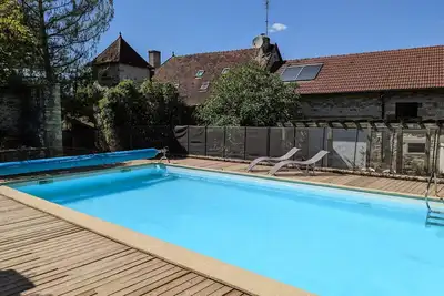 Image de Maison traditionnelle en pierre avec piscine, salle de sport et gîte indépendant de 2 chambres