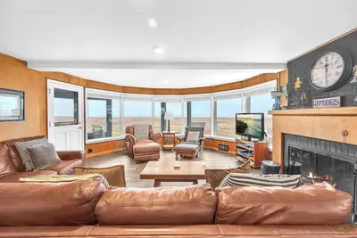 Image de Belle maison en bord de mer juste parfait pour votre famille et votre compagnon canin!