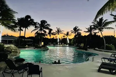 Image de Ocean Dream 1 Chambre avec vue sur l'océan, la piscine et le jardin