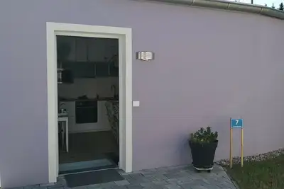 Image de Appartement sans barrière avec douche à effet pluie