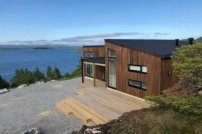 Image de Nouvelle maison de vacances, idéalement située en bord de mer