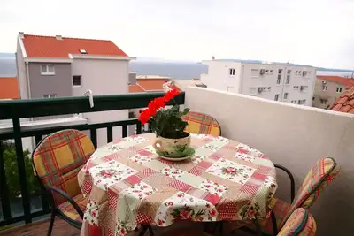 Image de Appartement de deux chambres avec la terrasse et la vue sur le mer Makarska (A-9129-e)