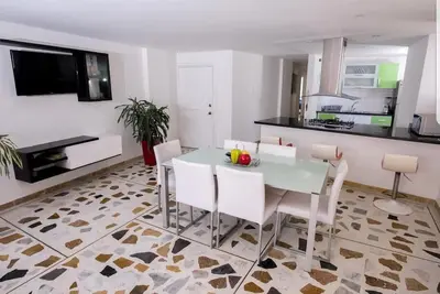 Image de Appartement familier frente a el mar