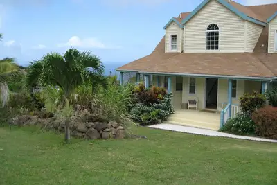 Image de Gingerland Colline Maison de vacances avec piscine et Nevis Vues de montagne et l'océan.
