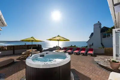 Image de Maison de vacances Woolacombe pour 10 personnes avec bain à remous