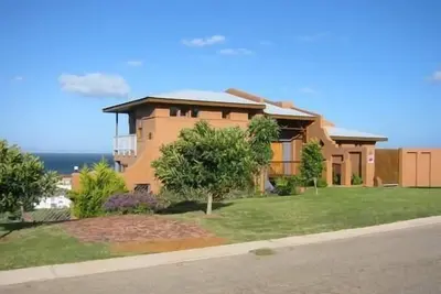 Image de Maison de vacances Jeffreys Bay pour 1 - 7 personnes avec 3 chambres à coucher - Domicile de vacance