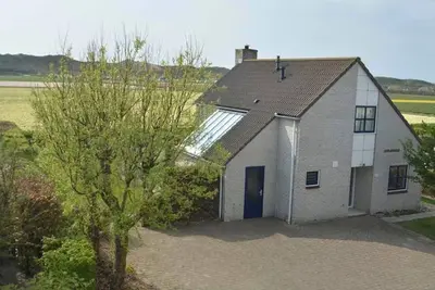 Image de Maison de vacances Julianadorp aan Zee pour 1 - 9 personnes avec 4 chambres à coucher - Domicile de