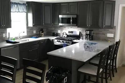 Image de Grande escapade en famille! À quelques minutes des attractions et du centre-ville!