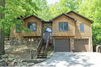 Image de Salle secrète cachée par une étagère, salle de jeux, bar, 3 salles de bains
