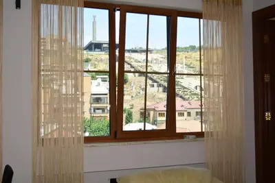 Image de Le studio Cascad Ellite Pent House se compose d'un salon et d'une chambre