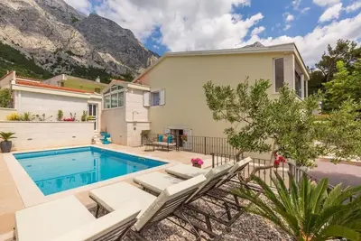 Image de Maison de vacances Makarska pour 1 - 8 personnes avec 4 chambres à coucher - Maison de vacances