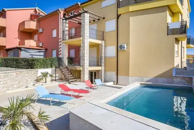 Image de Appartement de vacances pour 7 personnes env. 90 qmà Medulin, Istrie (Côte sud de l'Istrie)