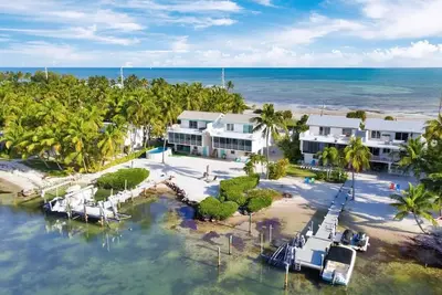 Image de Bayside Retreat - Adorable maison de 3 chambres au bord de la baie avec amarrage