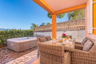 Image de Appartement de vacances avec air conditionné et jacuzzi