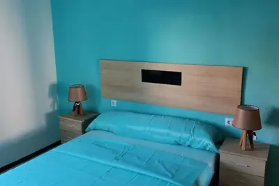 Image de Appartement familial WiFi - 3km de la plage