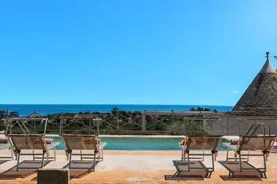 Image de Complex of trulli with private pool overlooking the sea