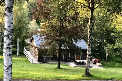 Image de Chalet Scandinave dans un écrin de verdure et de forêt. . .