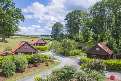 Image de Woodpecker Lodge - un pavillon pouvant accueillir 4 personnes dans 2 chambres