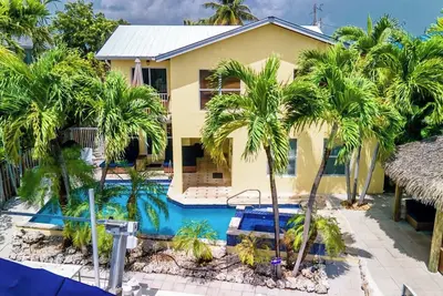 Image de Sweet Retreat 4 chambres 2. 5 salle de bains près de Sombrero Bch avec piscine, quai et jacuzzi