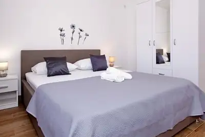 Image de Apartments Villa Senija - Appartement Standard 2 Chambres avec Terrasse et Vue sur la Mer (Coucher de Soleil)