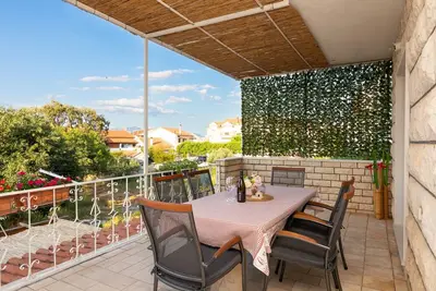 Image de Apartments Martić - Appartement 4 chambres avec terrasse et vue sur la mer - (St)