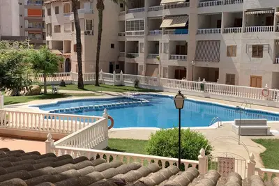 Image de Appartement dans un complexe résidentiel avec piscine à Playa de los Locos.
