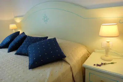 Image de Appartement confortable avec air conditionné, Tv satellite, machine à laver et proche de la plage