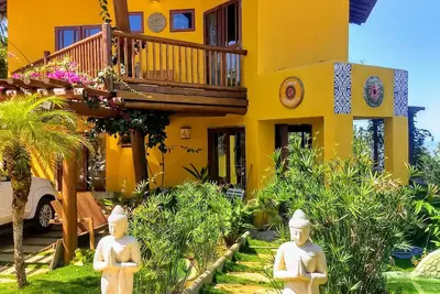 Image de La maison jaune Serra Grande Paradise est ici.