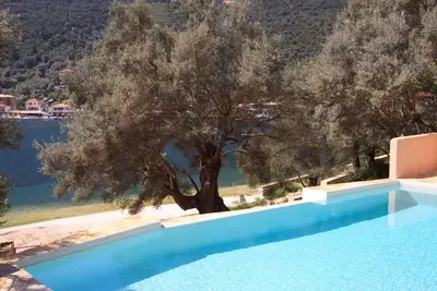 Image de Villa Amoudia - Luxueuse villa directement sur la plage avec piscine privée