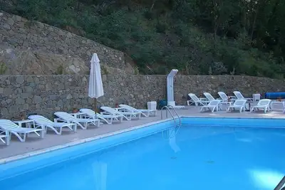 Image de Villa Floriana G: Un appartement élégant et accueillant entouré d'un paysage magnifique.