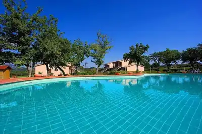 Image de Casa Pegaso A: Un appartement confortable situé dans une région vallonnée.