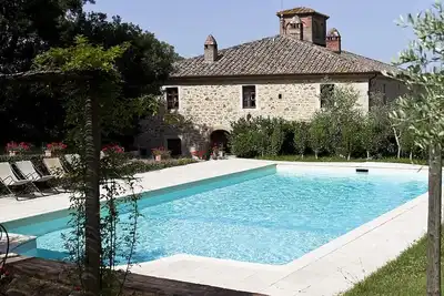 Image de Casa Adalberto D: Un appartement agréable et spacieux qui fait partie d'une ancienne ferme située dans une région vallonnée.