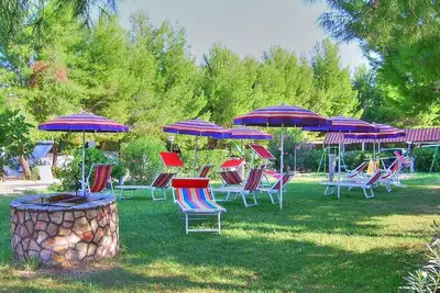 Image de Casa Vea D: Un appartement confortable situé à une courte distance de la plage.